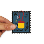 Aufkleber Floppy mit Schnecken wird in der Hand gehalten